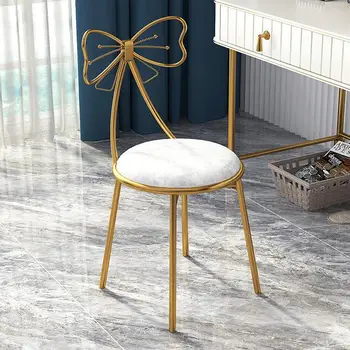 איפור כיסא מודרני מינימליסטי שולחן איפור צואה נטו אדום פרפר הזהב בבית הכיסא משענת הכיסא.